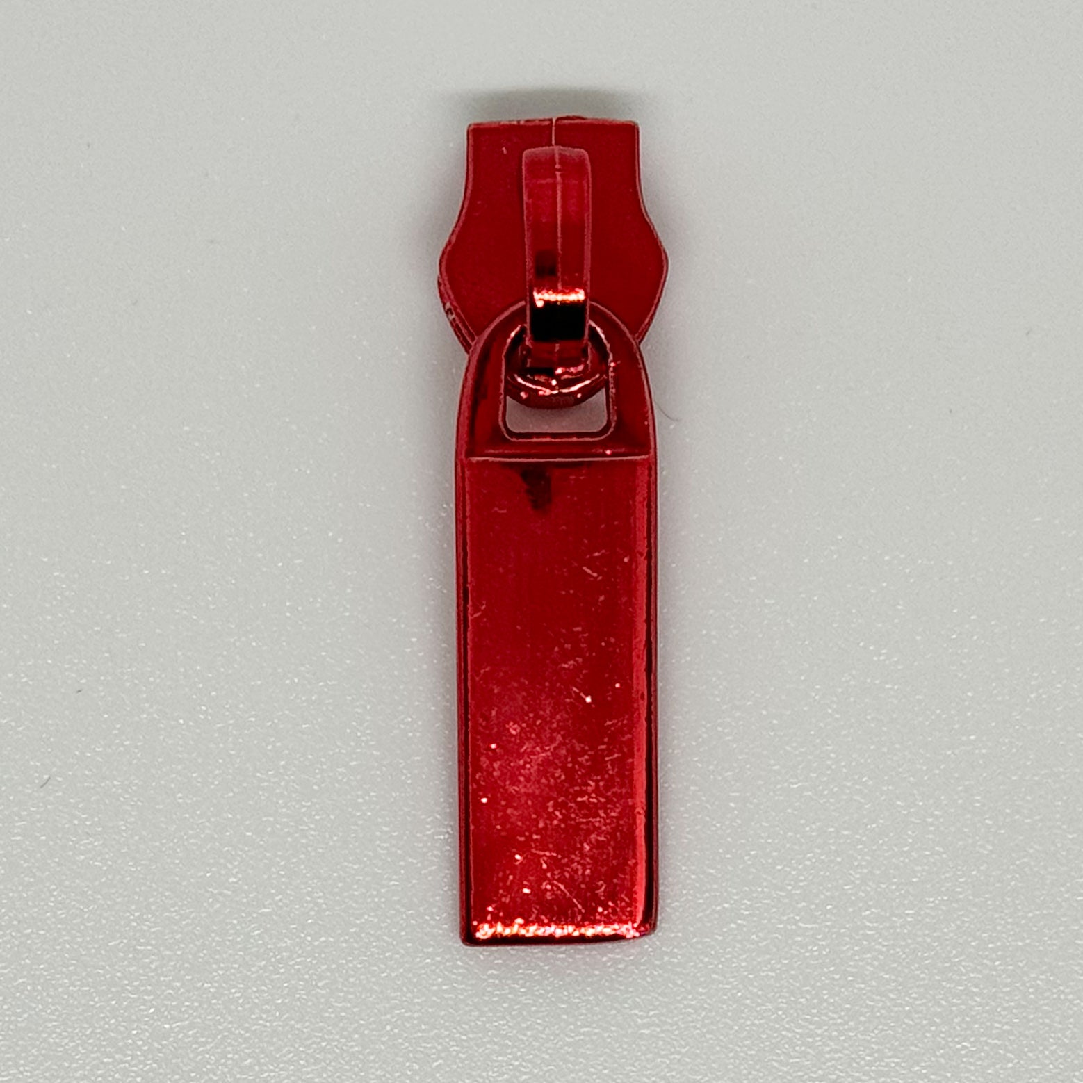 Shiny Red Zipper Pull image 0