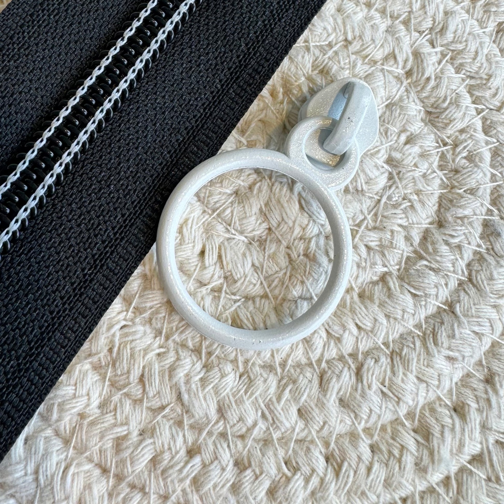 White Circle Zipper Pull image 0